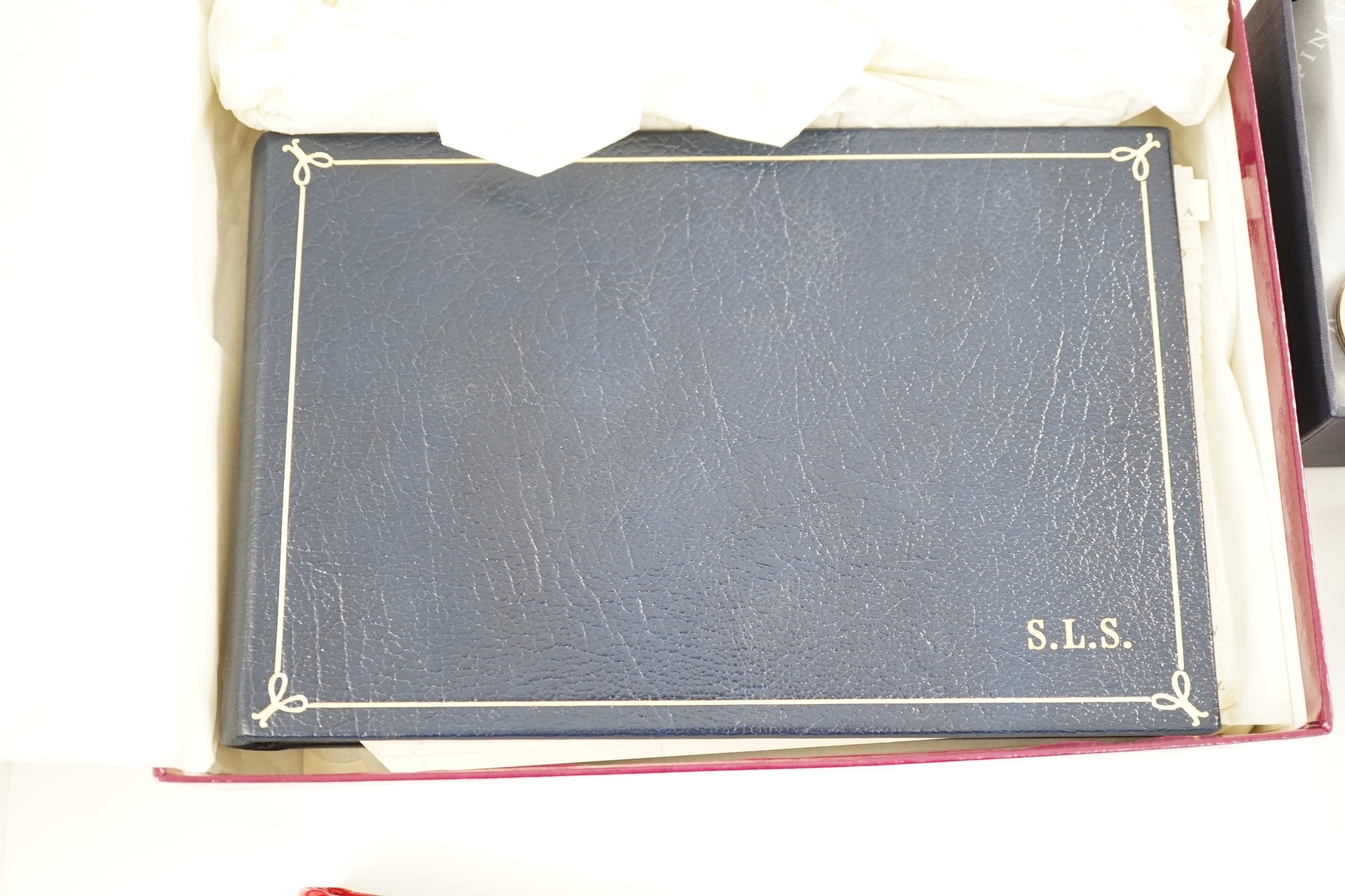 A set of two Asprey leather address books (initialled), an Asprey snakeskin wallet, a Loewe brown leather wallet and an Aspinal heart key fob